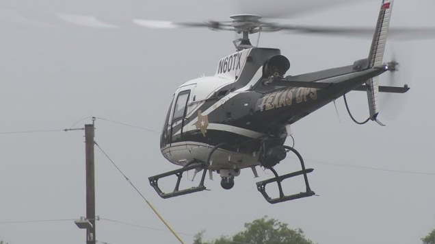 Airbus H125 helicopter in rotorcraft disaster response delivering supplies to flooded South Texas community